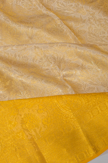 Taranga Kanchi Silk Tissue Brocade Gold Saree