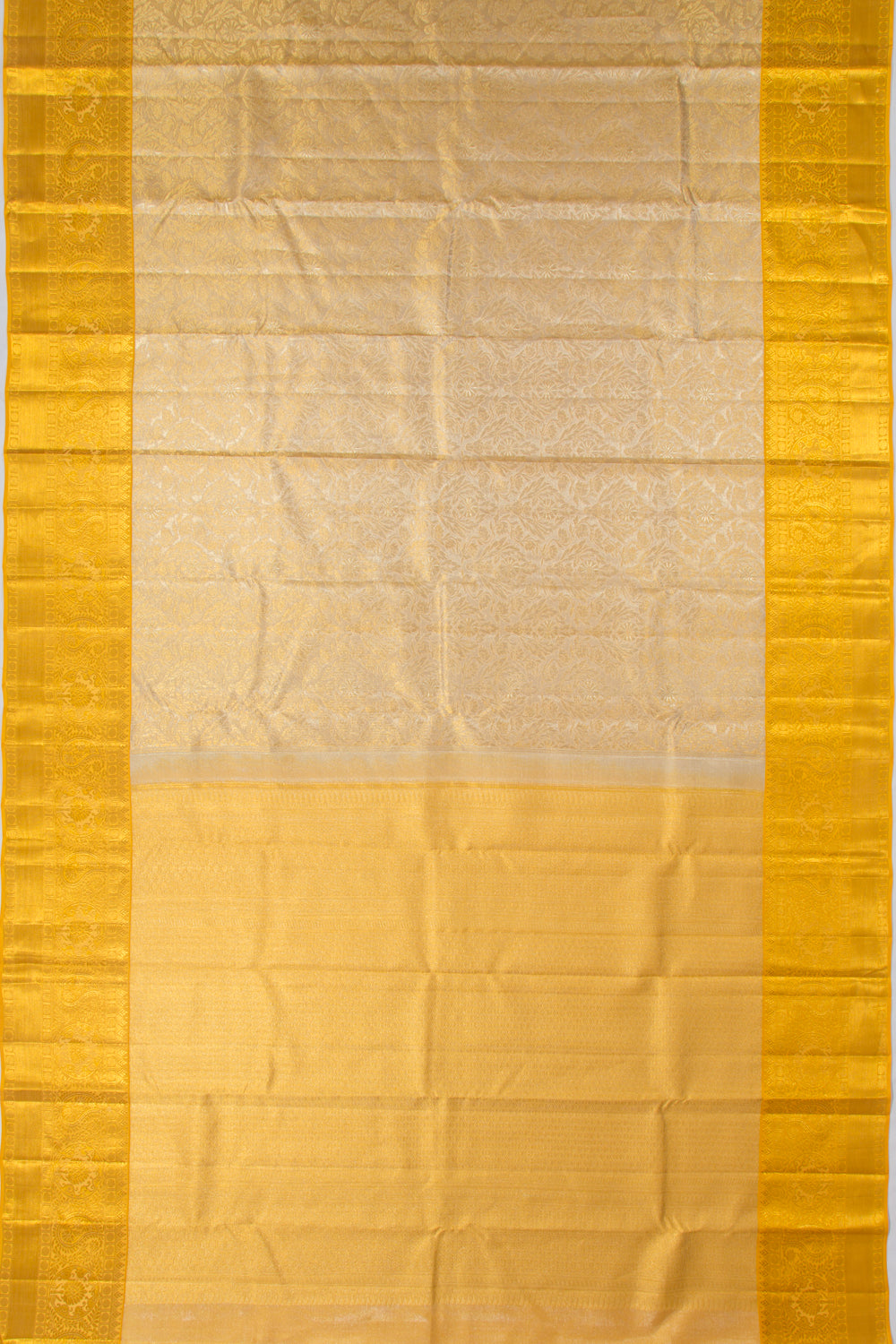Taranga Kanchi Silk Tissue Brocade Gold Saree