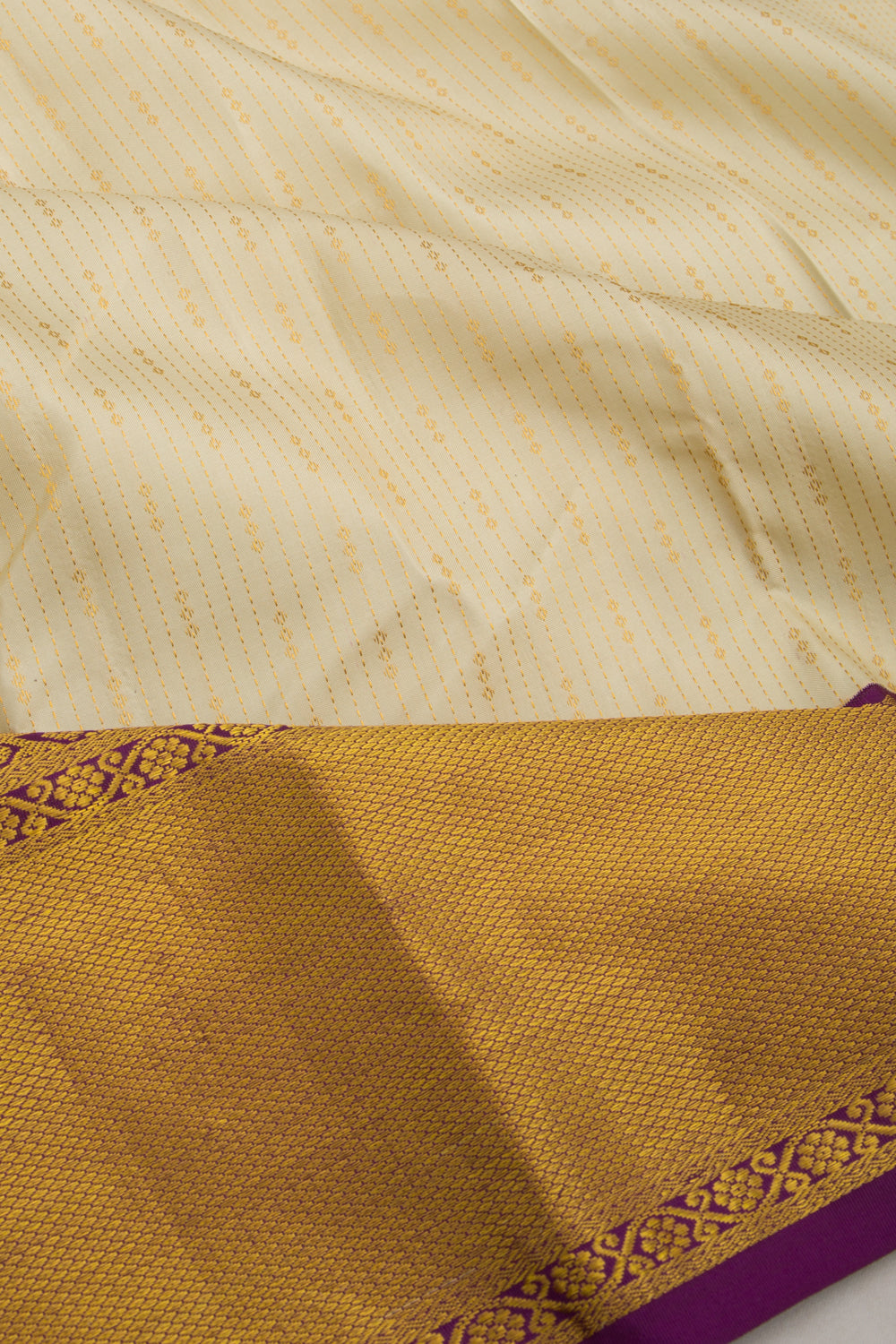 Taranga Kanchi Silk Brocade Cream Saree