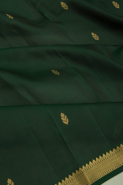 Taranga Kanchi Silk Butta Bottle Green Saree