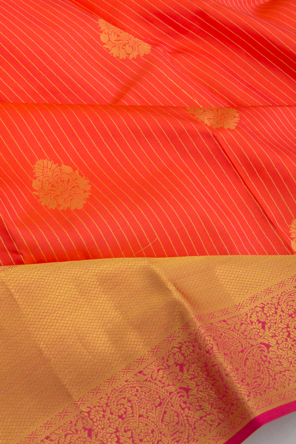 Taranga Kanchi Silk Lines And Butta Orange Saree