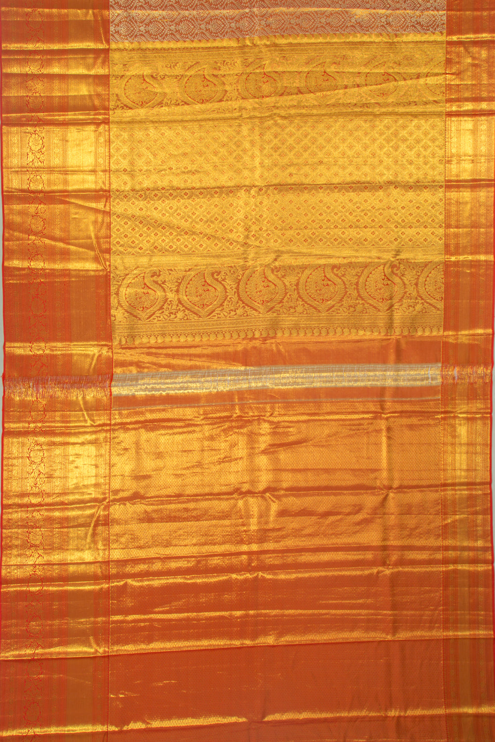 Taranga Kanchi Silk Tissue Brocade Orange Saree