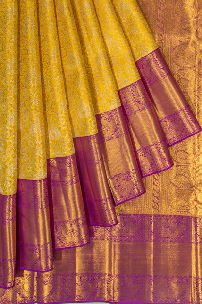 Taranga Kanchi Silk Tissue Brocade Yellow Saree