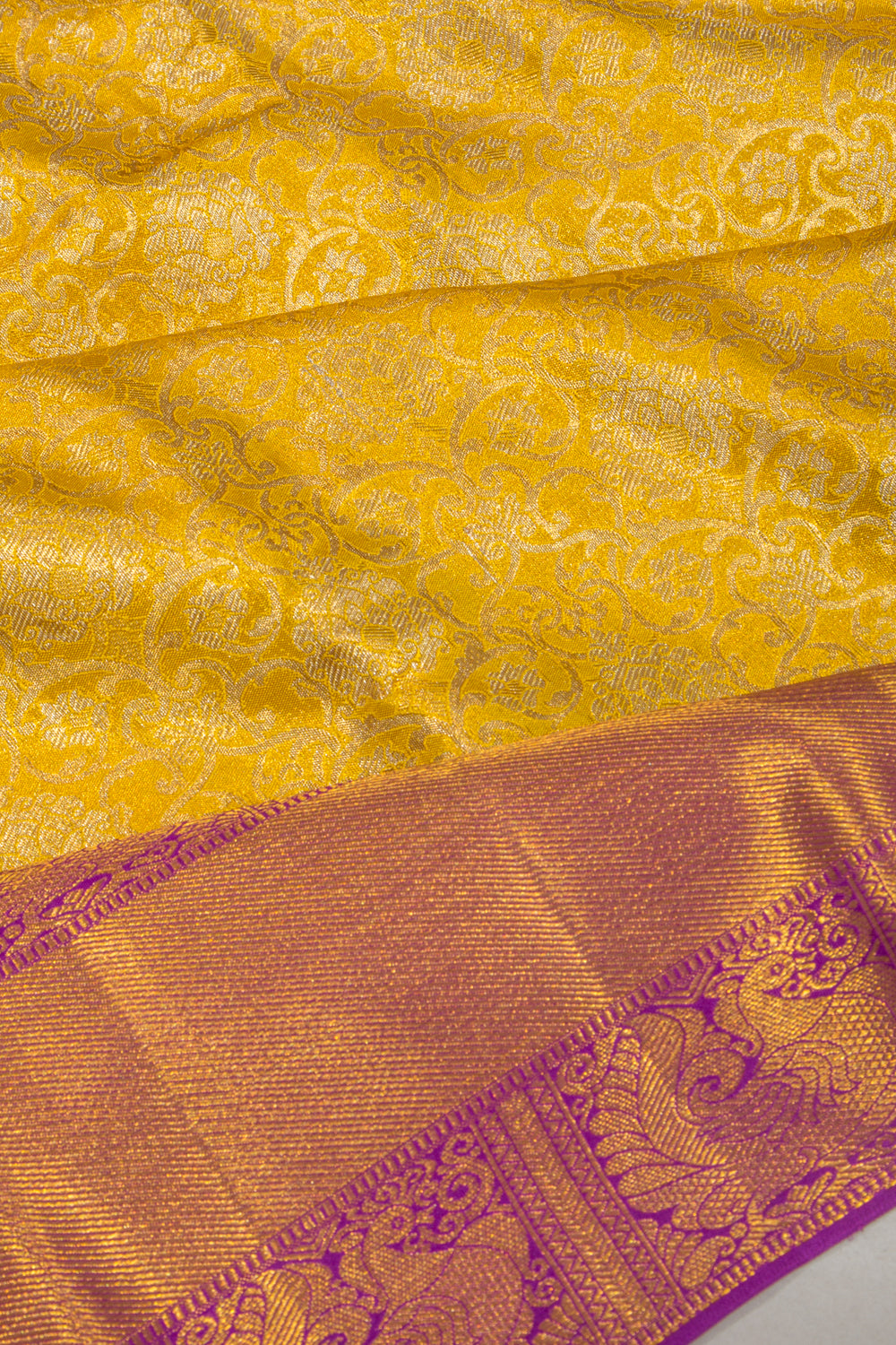 Taranga Kanchi Silk Tissue Brocade Yellow Saree