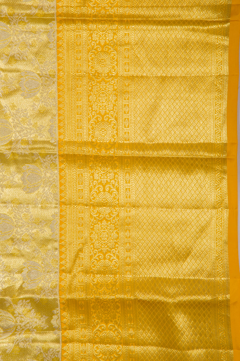 Taranga Kanchi Silk Tissue Jaal Gold Saree