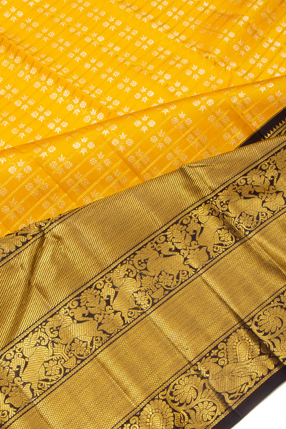 Kanchipuram Silk Checks And Butta Yellow Saree