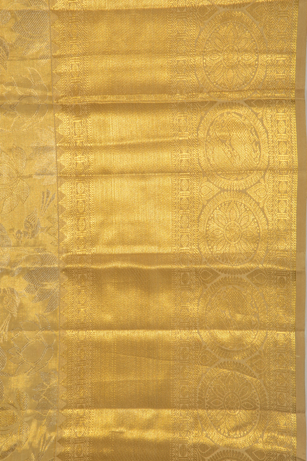 Taranga Kanchi Silk Tissue Jaal Gold Saree