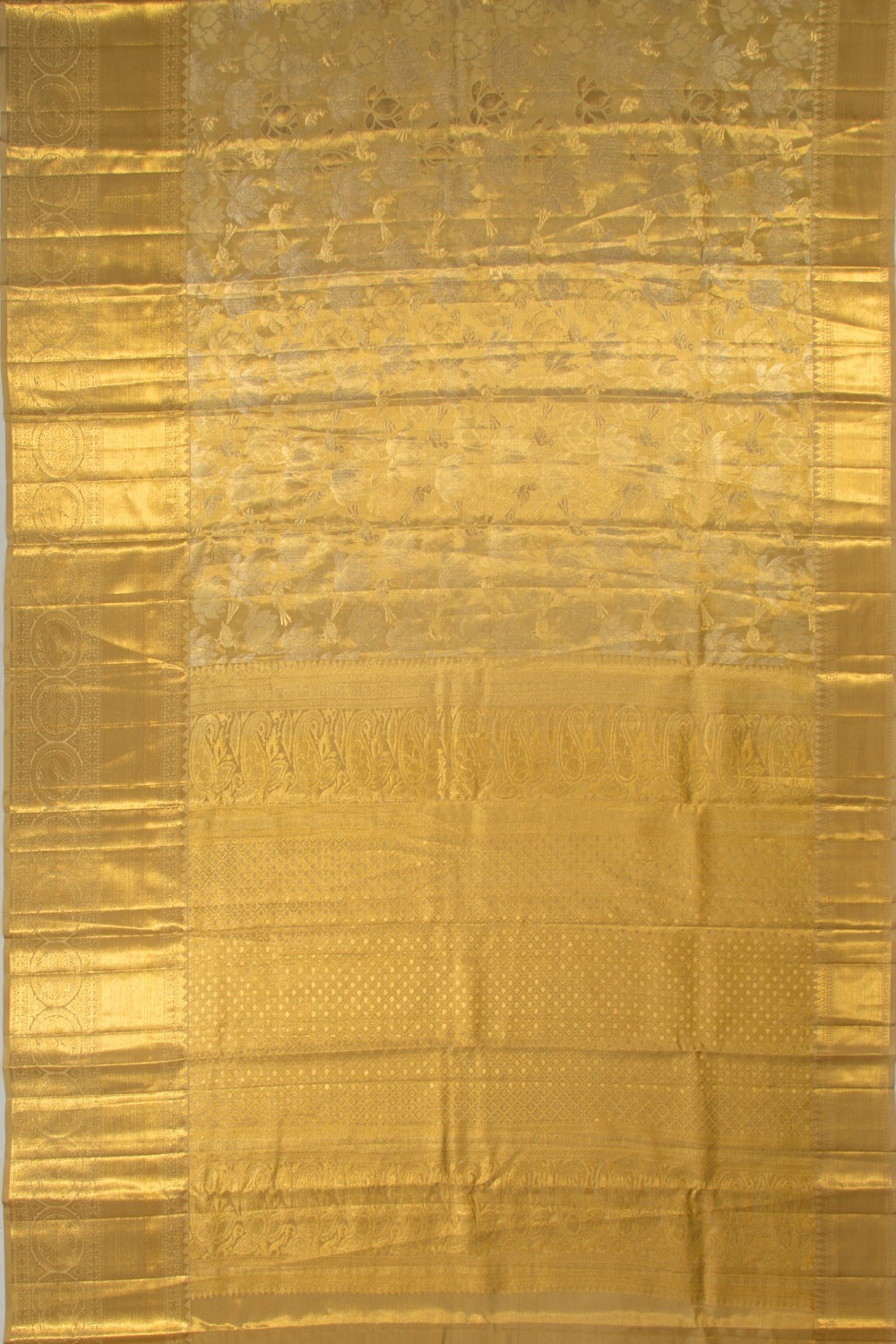 Taranga Kanchi Silk Tissue Jaal Gold Saree