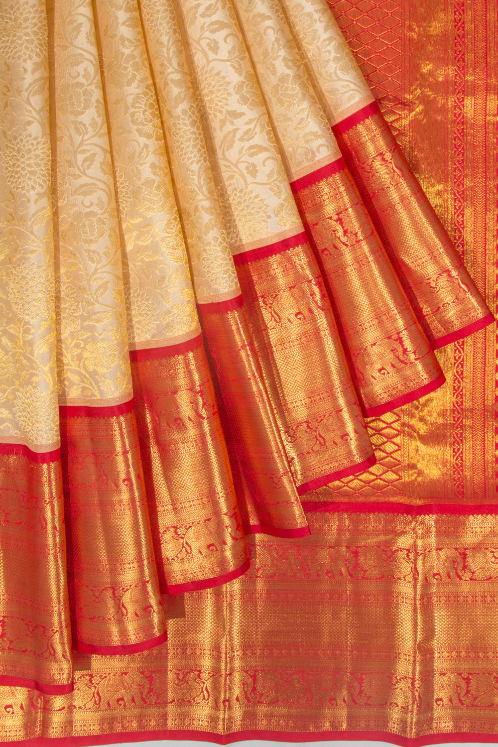 Taranga Kanchi Silk Jaal Pastel Orange Saree