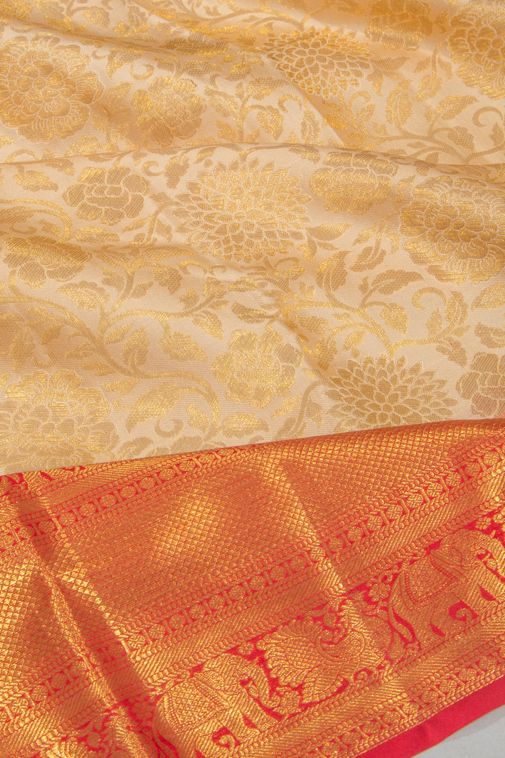 Taranga Kanchi Silk Jaal Pastel Orange Saree