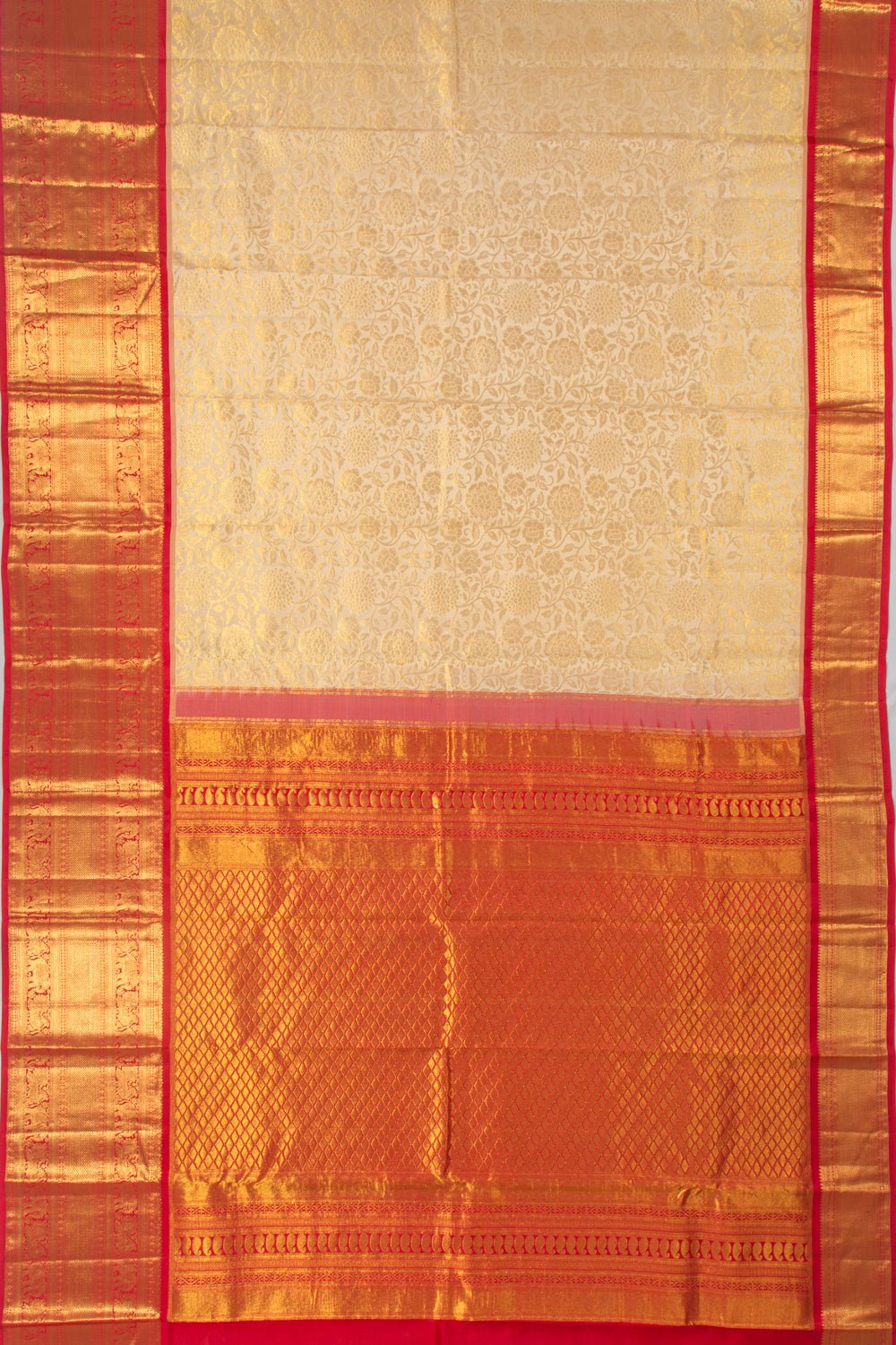 Taranga Kanchi Silk Jaal Pastel Orange Saree