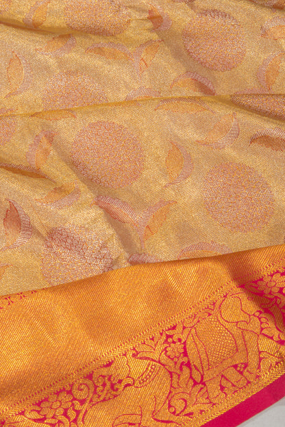Taranga Kanchi Silk Tissue Brocade Gold Saree