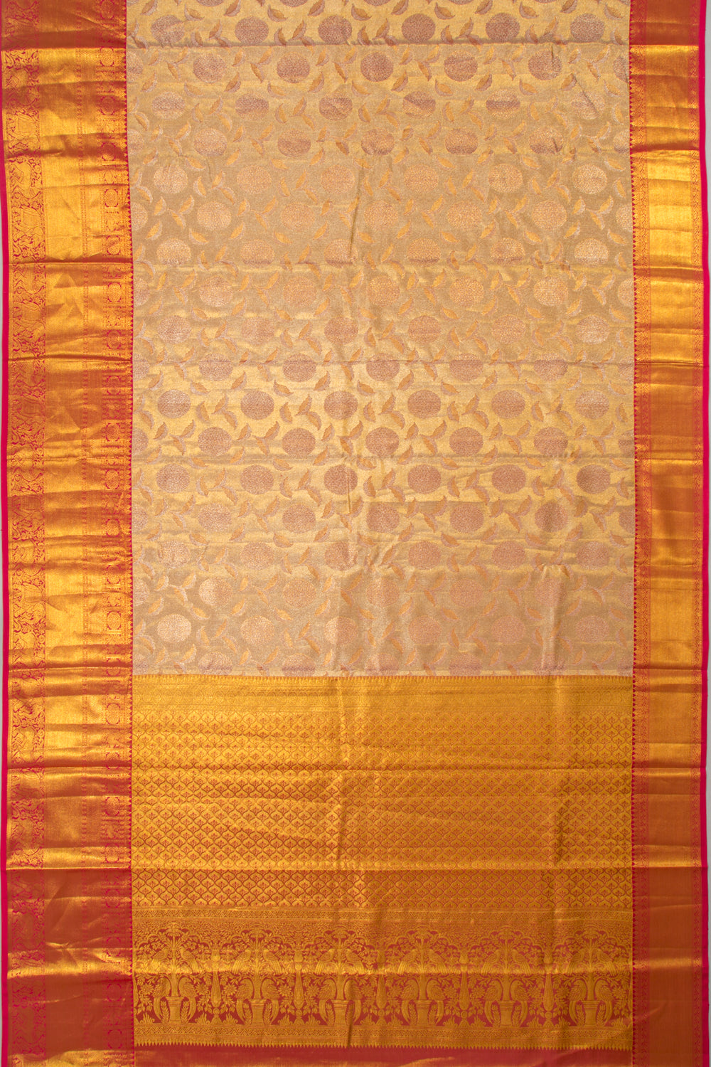Taranga Kanchi Silk Tissue Brocade Gold Saree