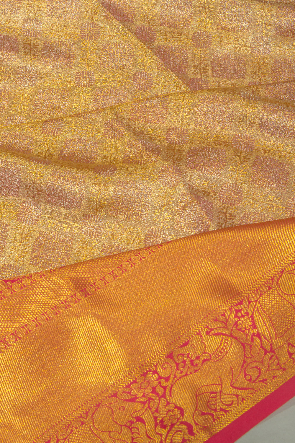 Taranga Kanchi Silk Tissue Brocade Gold Saree