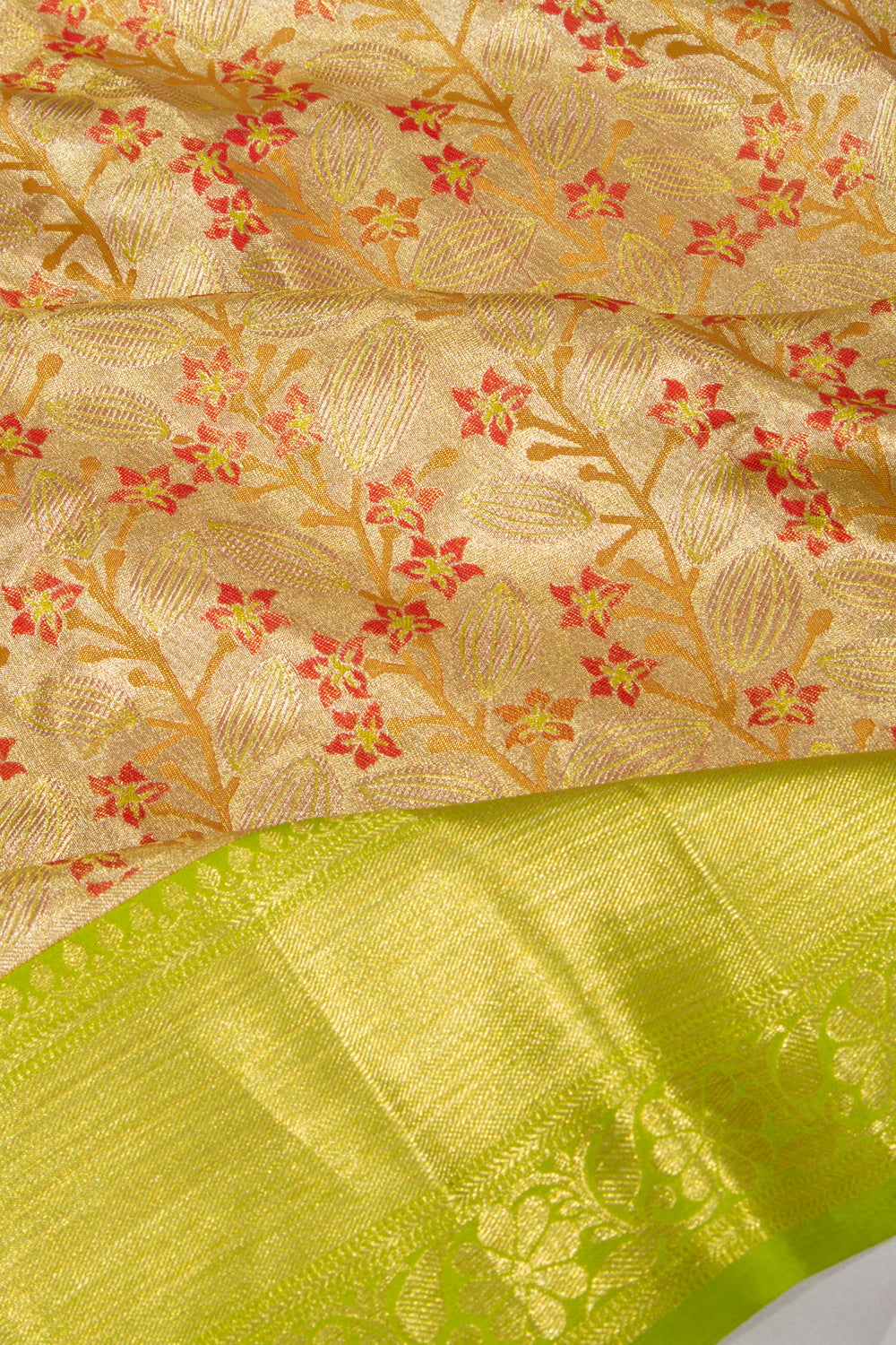 Taranga Kanchi Silk Tissue Jaal Gold Saree