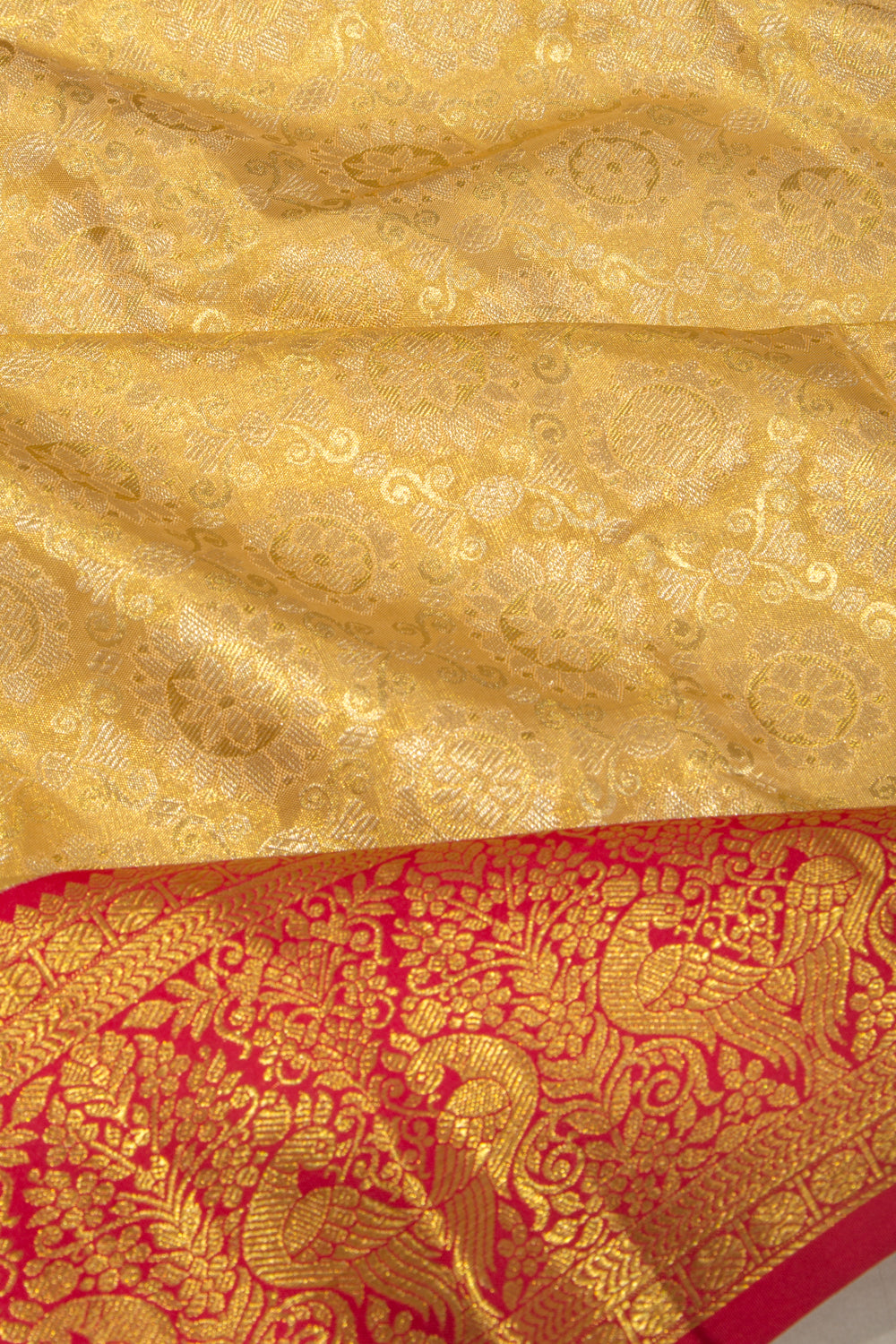 Taranga Kanchi Silk Tissue Brocade Gold Saree