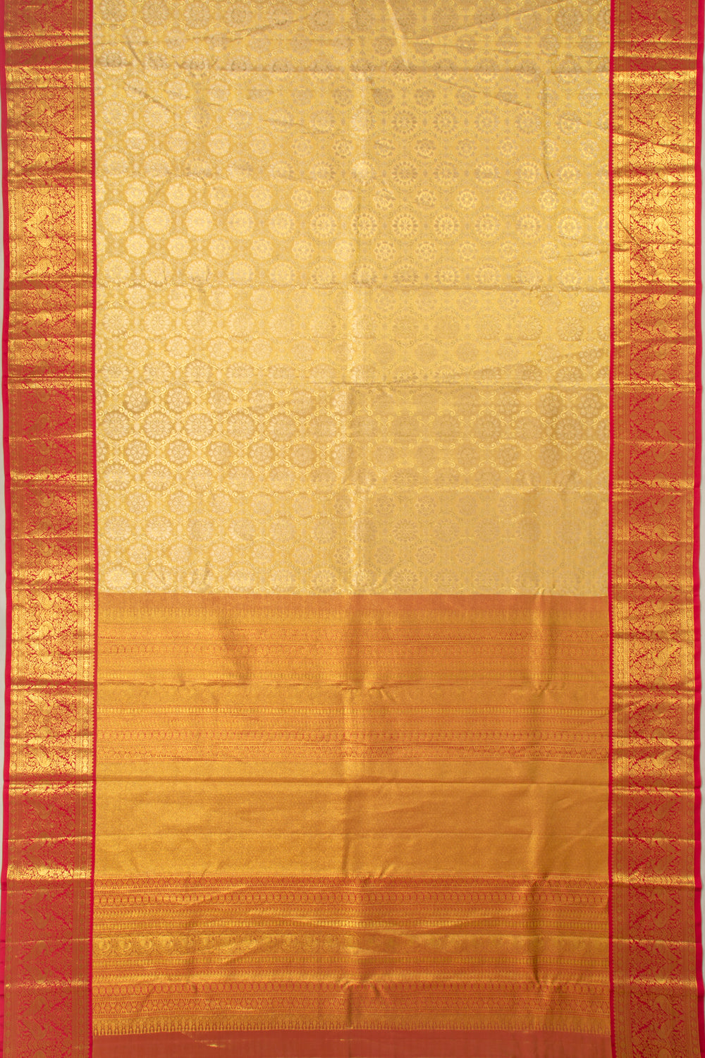 Taranga Kanchi Silk Tissue Brocade Gold Saree