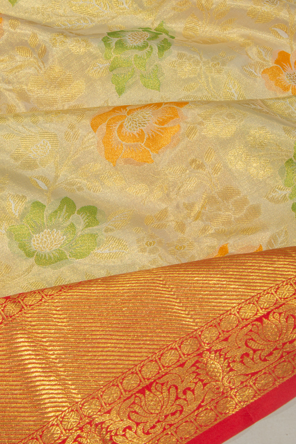 Taranga Kanchi Silk Tissue Jaal Gold Saree