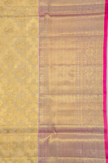 Taranga Kanchi Silk Tissue Brocade Cream Saree