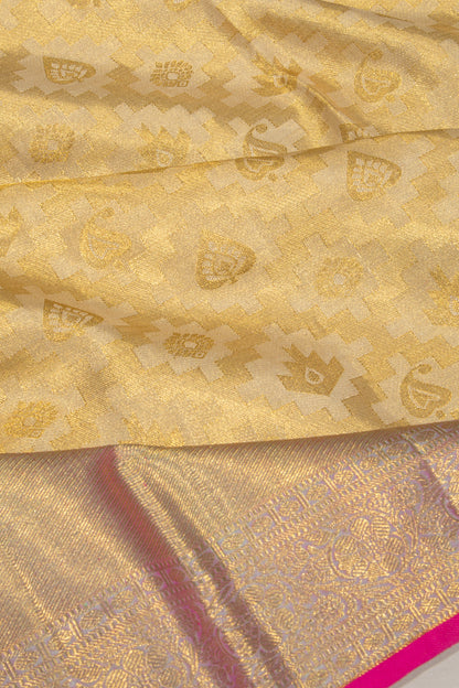 Taranga Kanchi Silk Tissue Brocade Cream Saree