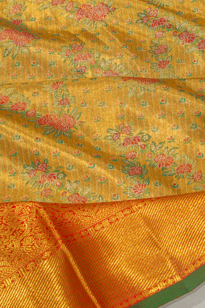 Taranga Kanchi Silk Tissue Brocade Gold Saree