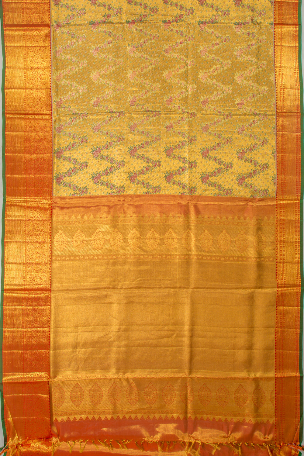 Taranga Kanchi Silk Tissue Brocade Gold Saree