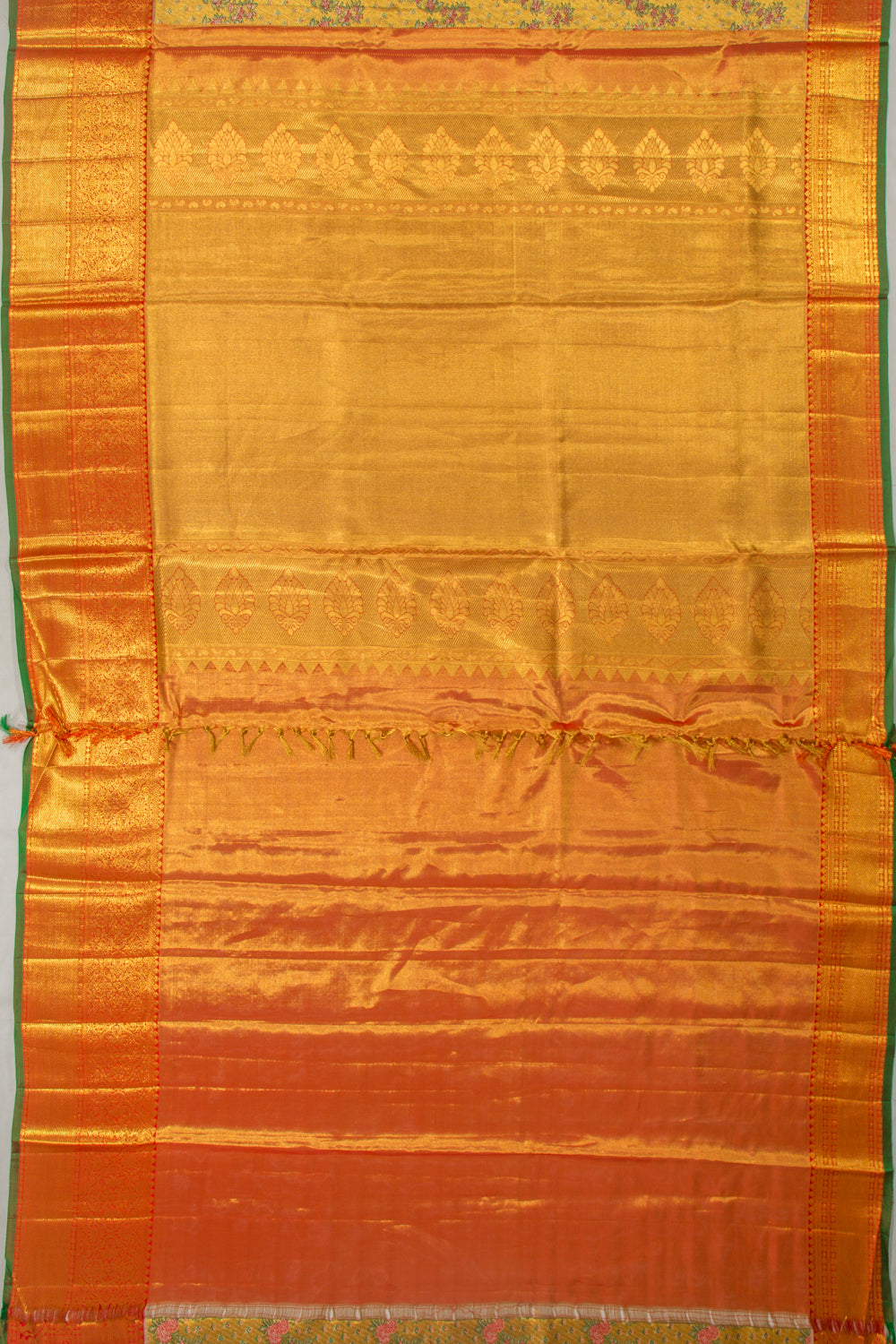Taranga Kanchi Silk Tissue Brocade Gold Saree