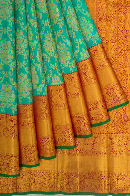 Taranga Kanchi Silk Jaal And Butta Sea Green Saree