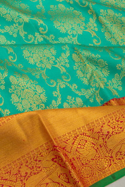 Taranga Kanchi Silk Jaal And Butta Sea Green Saree