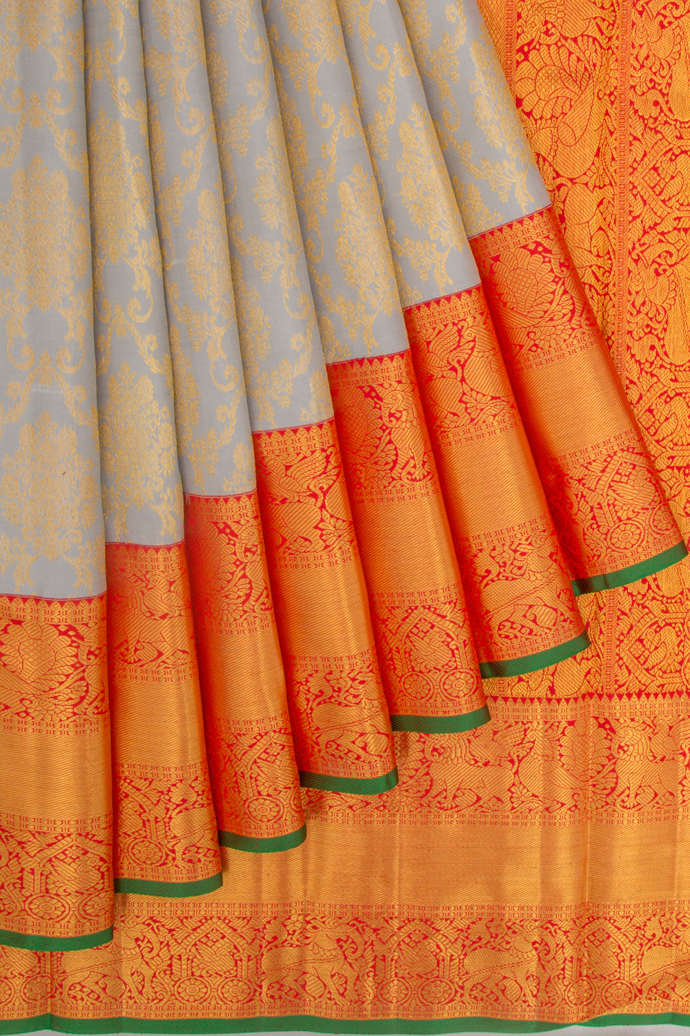 Taranga Kanchi Silk Jaal And Butta Grey Saree