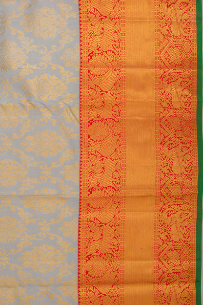 Taranga Kanchi Silk Jaal And Butta Grey Saree