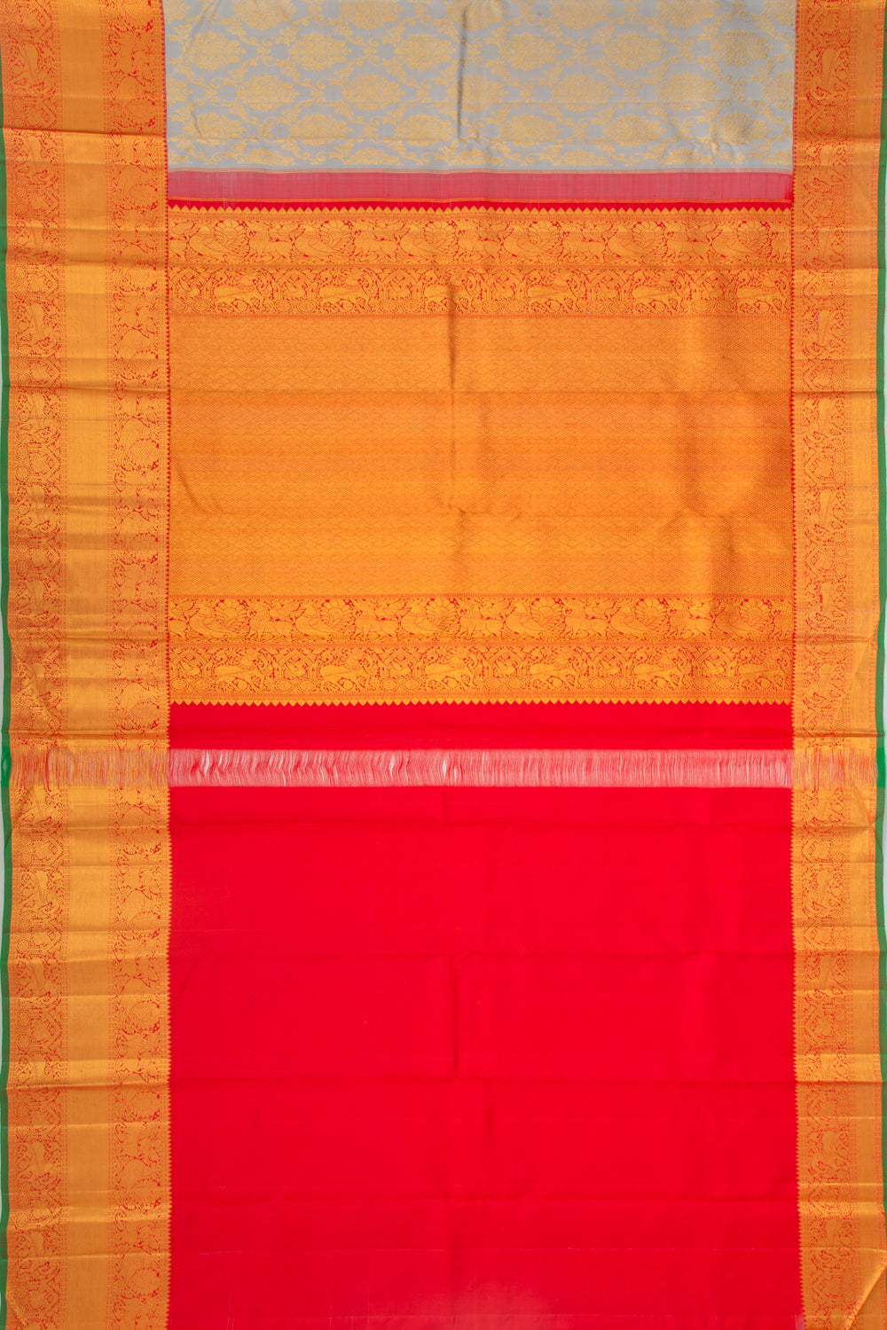 Taranga Kanchi Silk Jaal And Butta Grey Saree