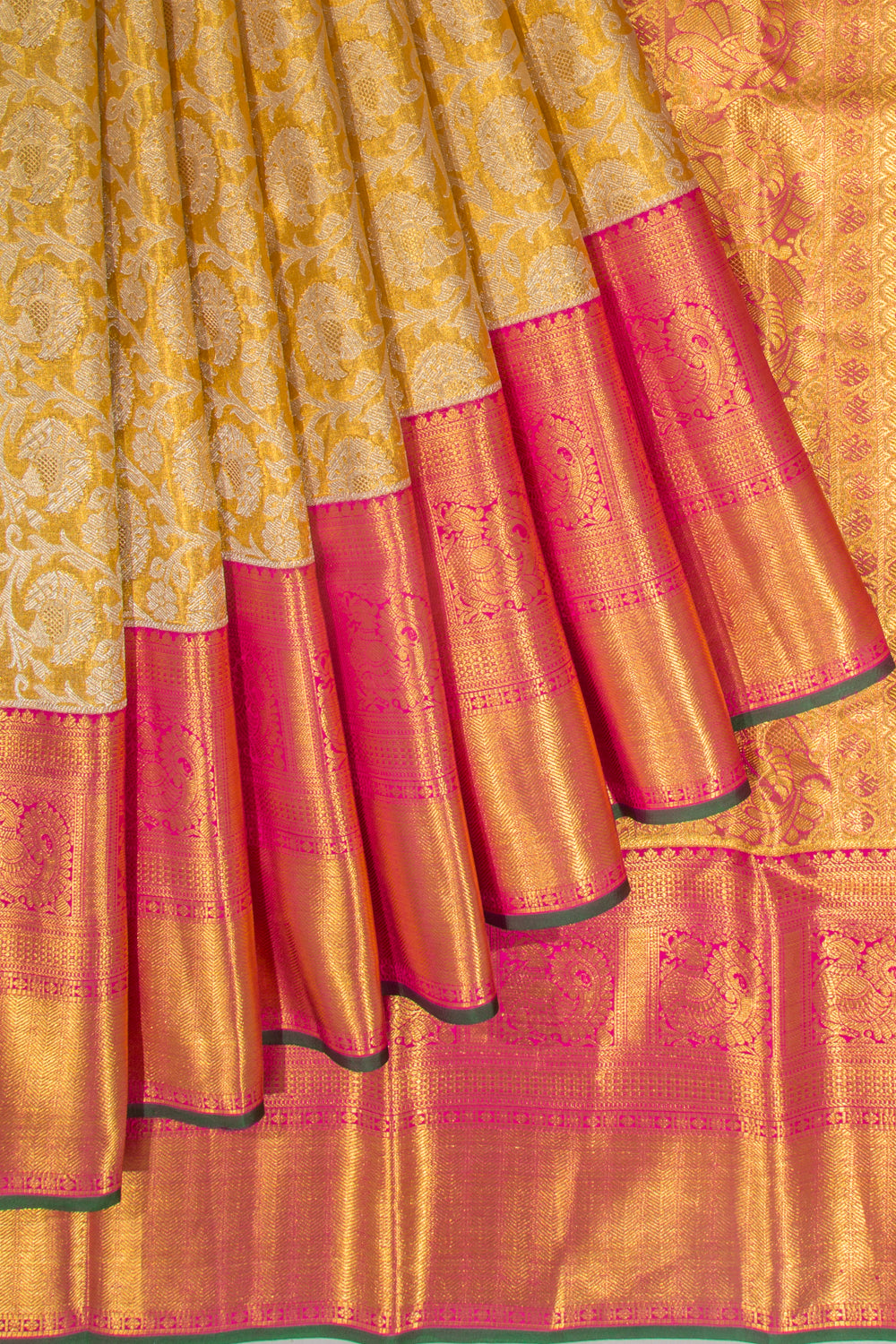 Taranga Kanchi Silk Tissue Jaal Gold Saree