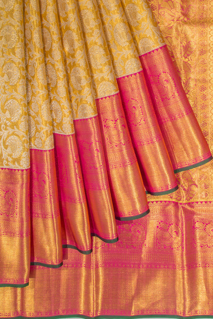 Taranga Kanchi Silk Tissue Jaal Gold Saree