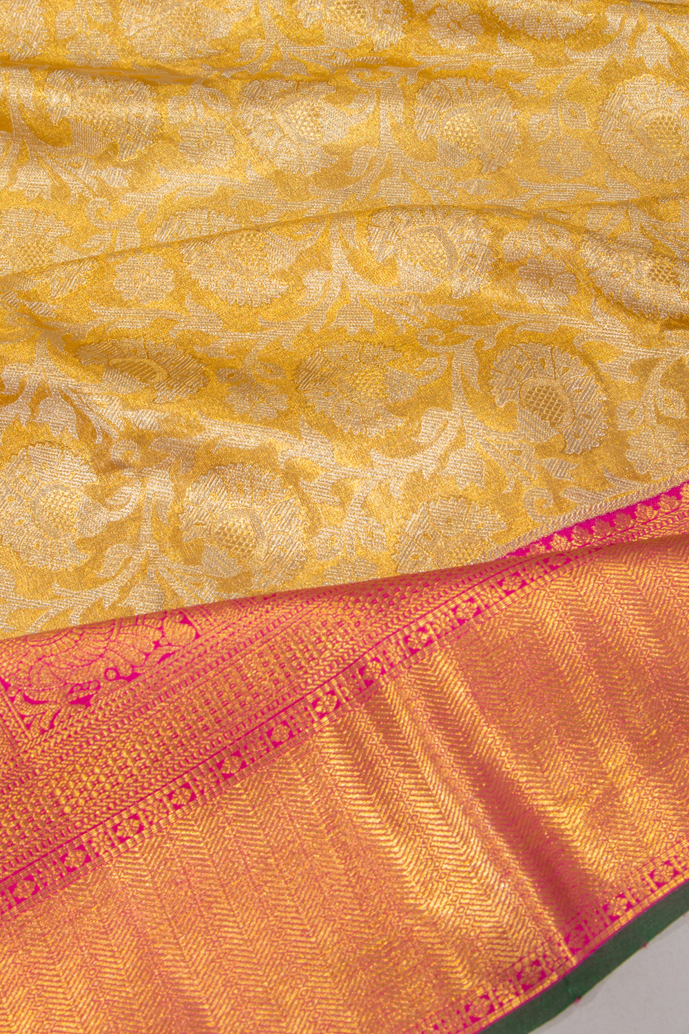 Taranga Kanchi Silk Tissue Jaal Gold Saree