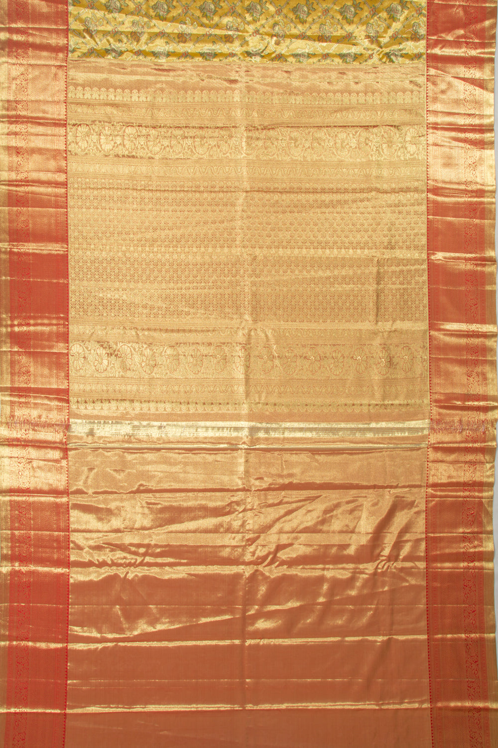 Taranga Kanchi Silk Tissue Criss Cross Checks And Butta Gold Saree