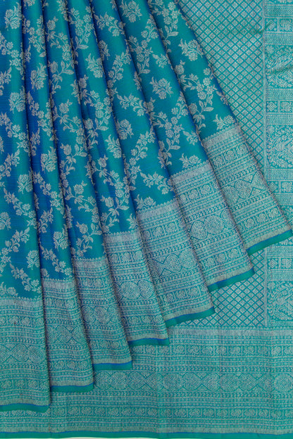 Kanchipuram Silk Jaal And Butta Dual Tone Blue And Green Saree