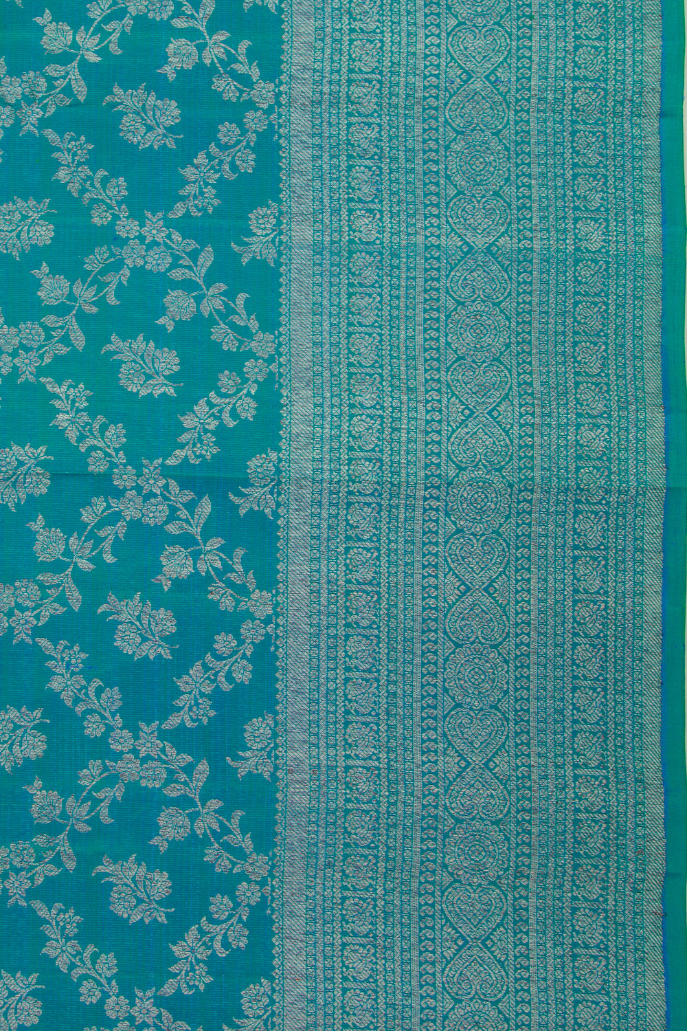 Kanchipuram Silk Jaal And Butta Dual Tone Blue And Green Saree