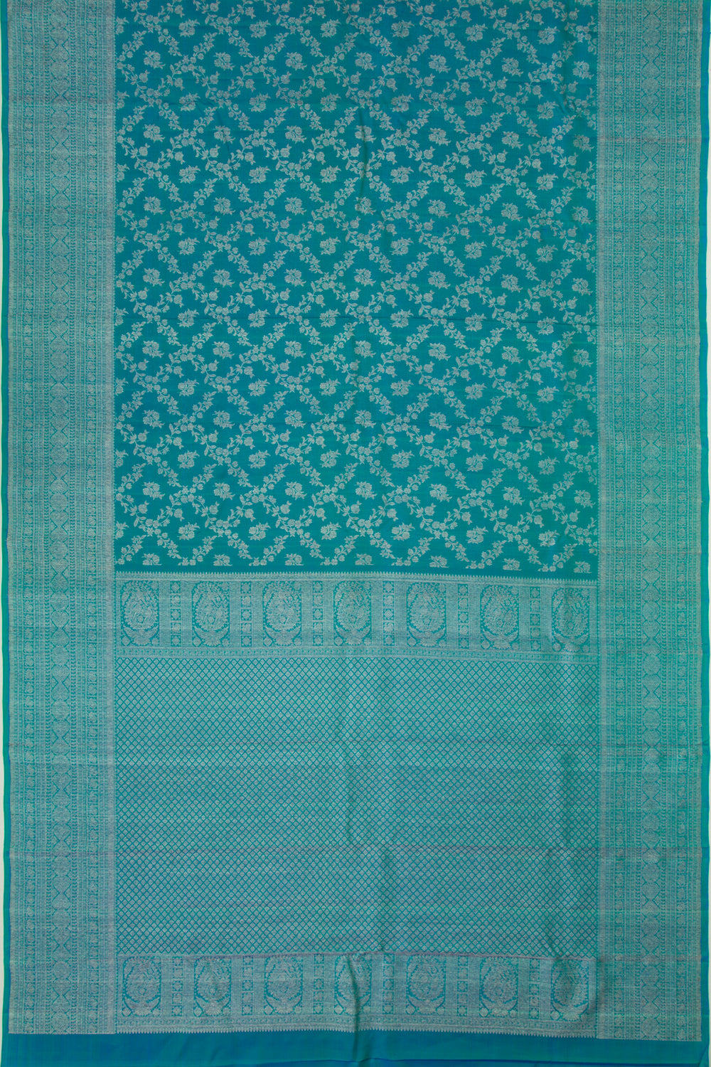 Kanchipuram Silk Jaal And Butta Dual Tone Blue And Green Saree