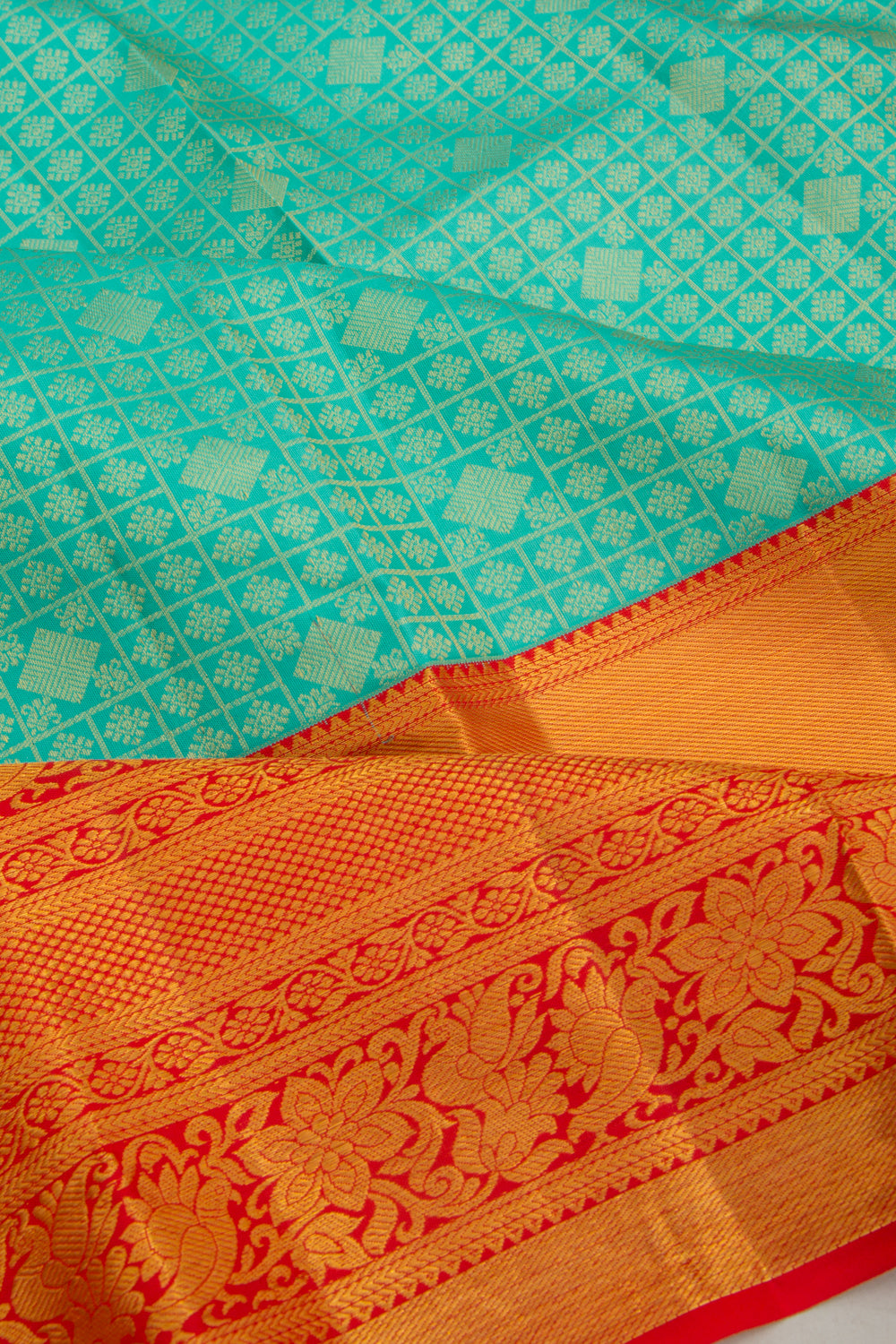 Taranga Kanchi Silk Checks And Butta Sea Green Saree
