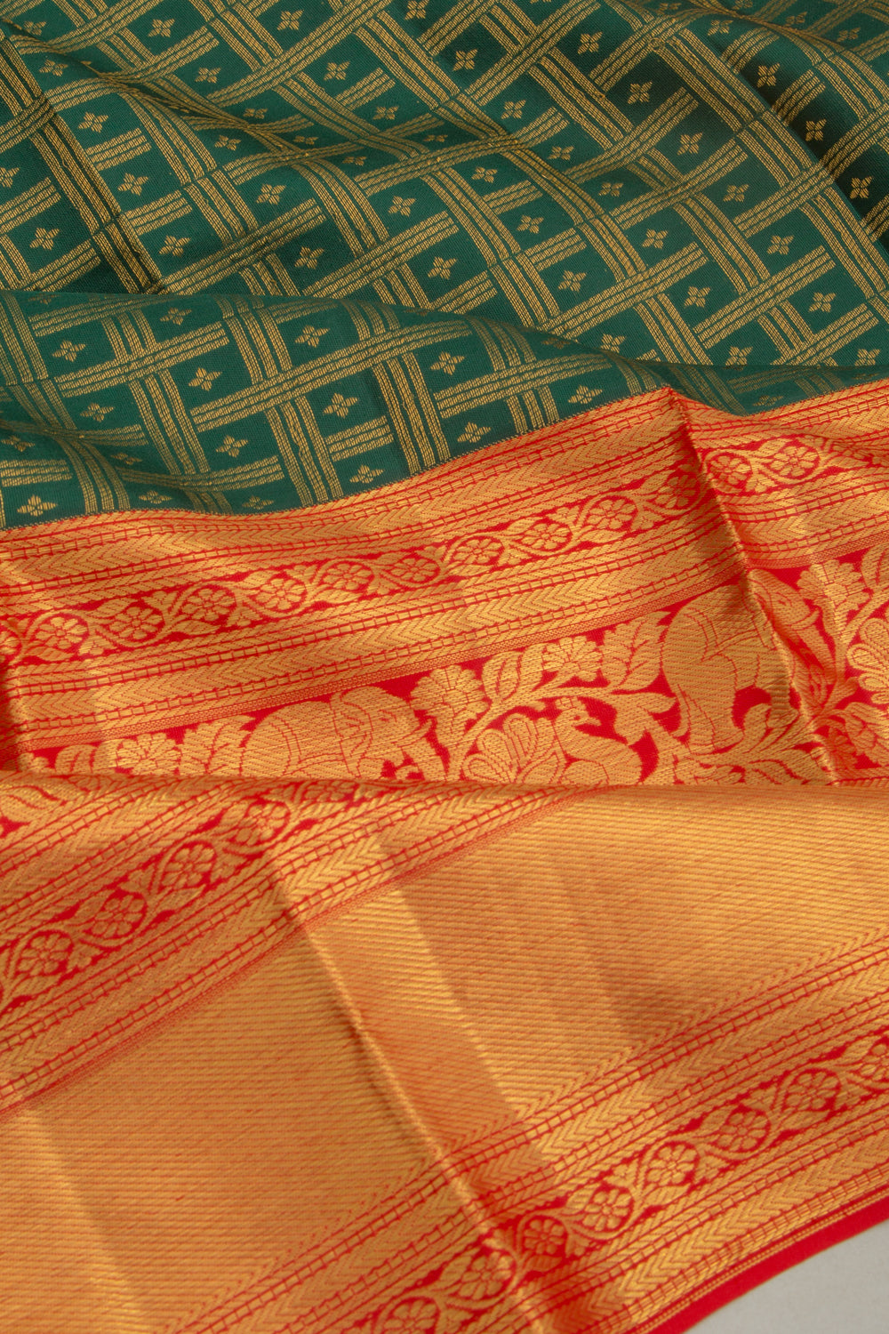 Taranga Kanchi Silk Checks And Butta Bottle Green Saree