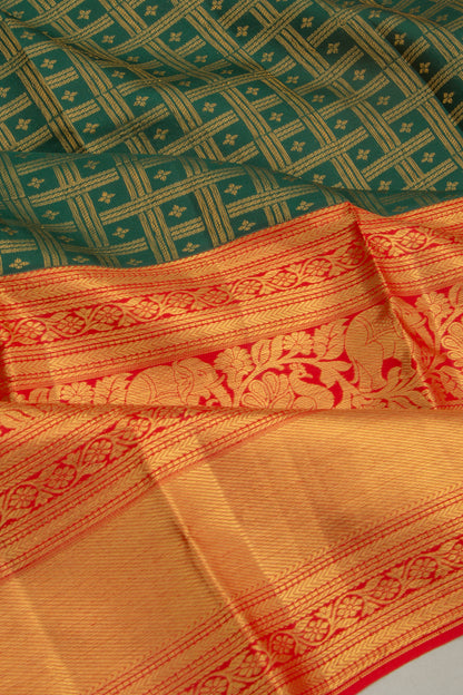 Taranga Kanchi Silk Checks And Butta Bottle Green Saree