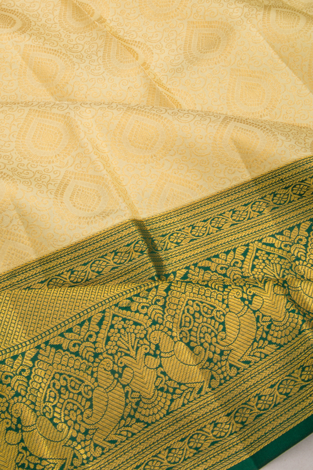 Taranga Kanchi Silk Brocade Cream Saree