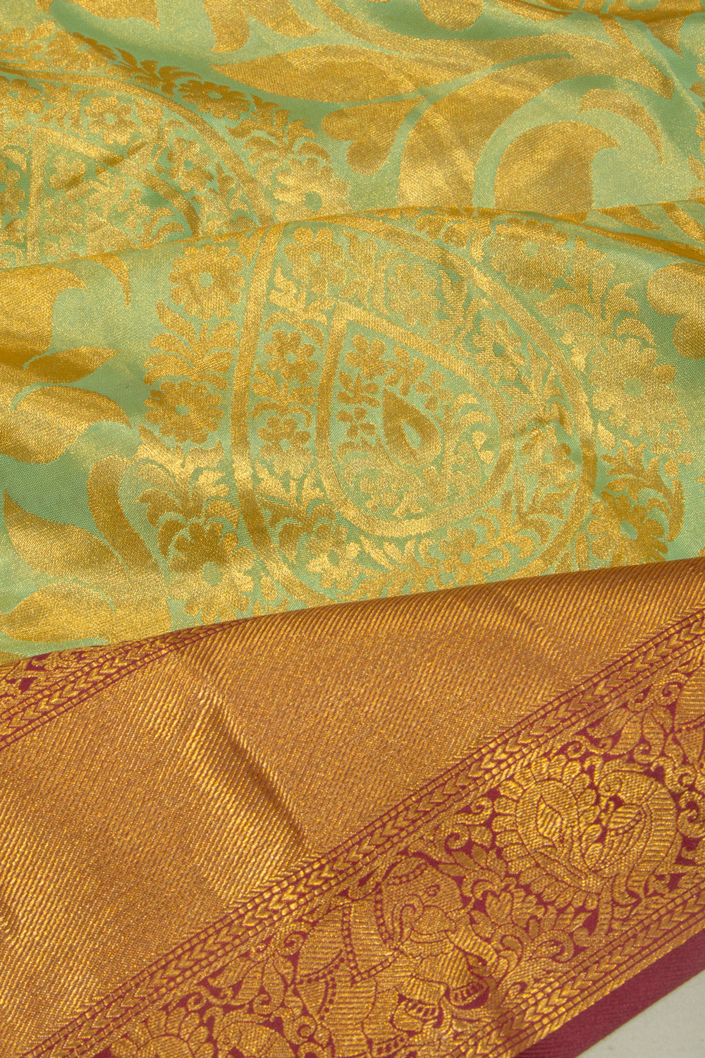 Taranga Kanchi Silk Tissue Jaal Green Saree