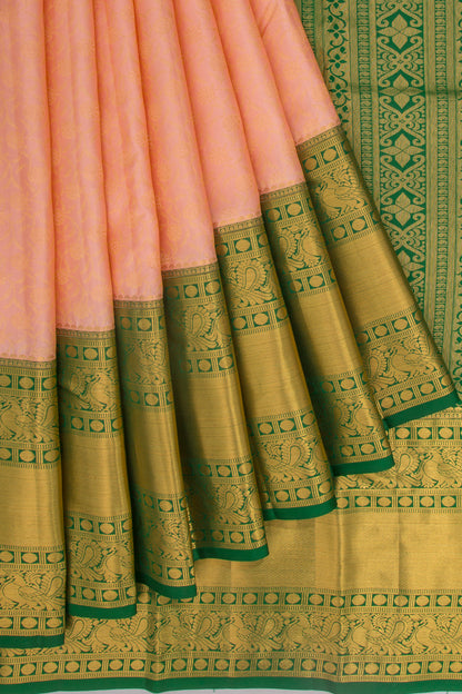 Taranga Kanchi Silk Jaal Pastel Orange Saree