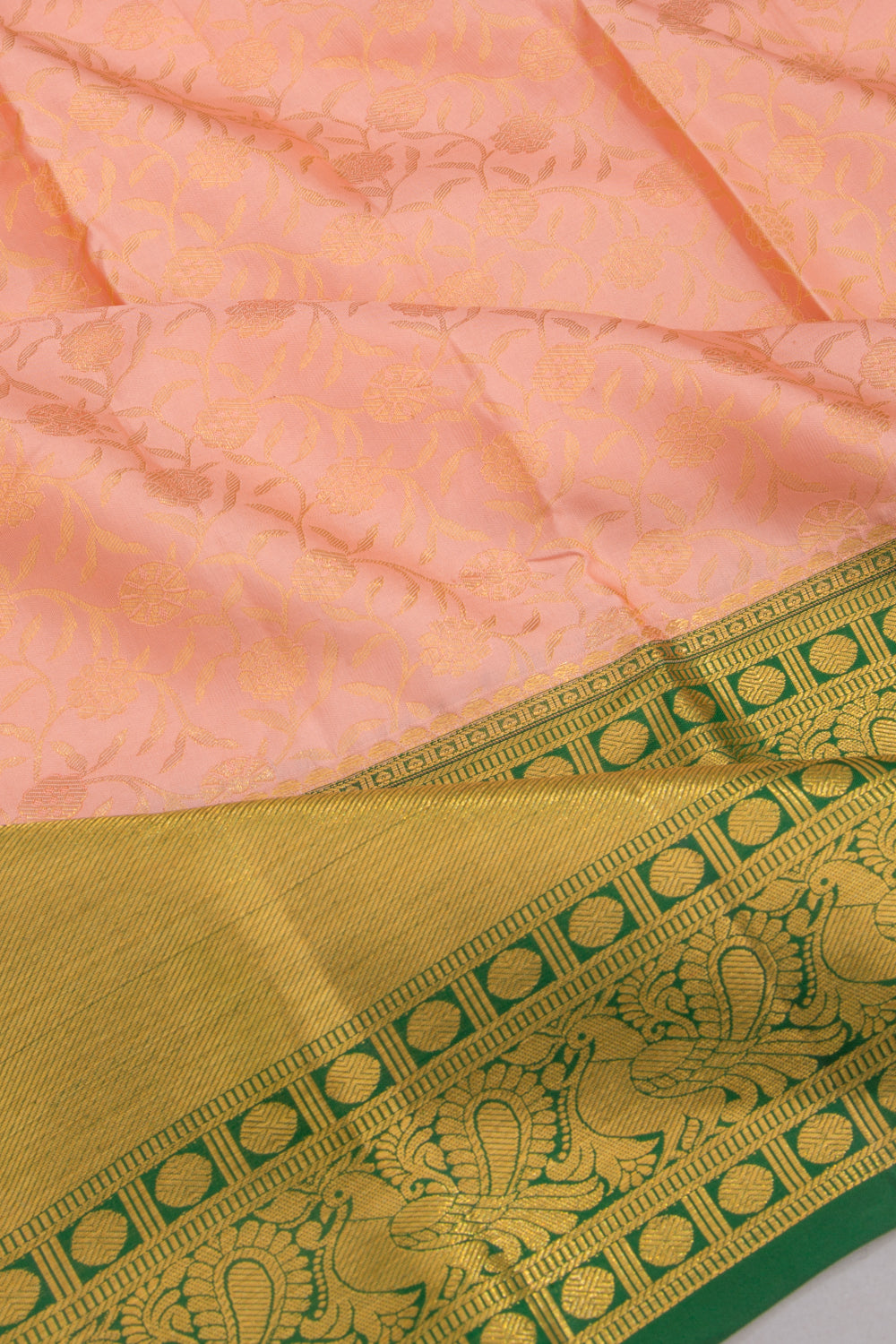Taranga Kanchi Silk Jaal Pastel Orange Saree