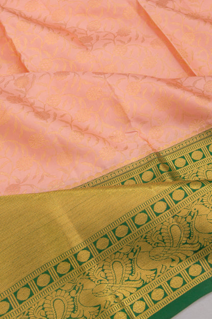 Taranga Kanchi Silk Jaal Pastel Orange Saree