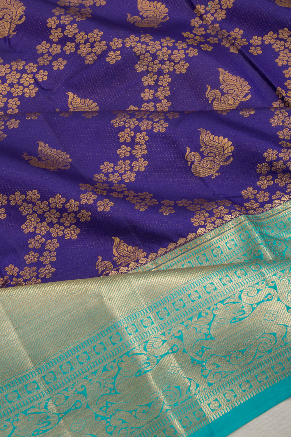 Taranga Kanchi Silk Jaal And Butta Dark Blue Saree