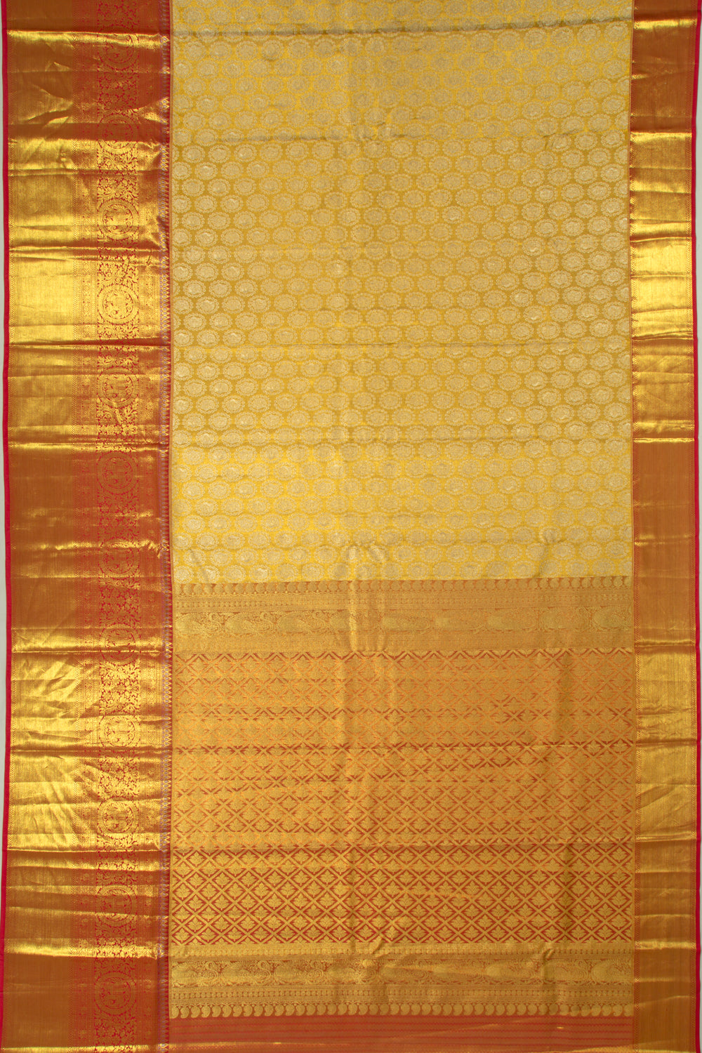 Taranga Kanchi Silk Tissue Brocade Gold Saree