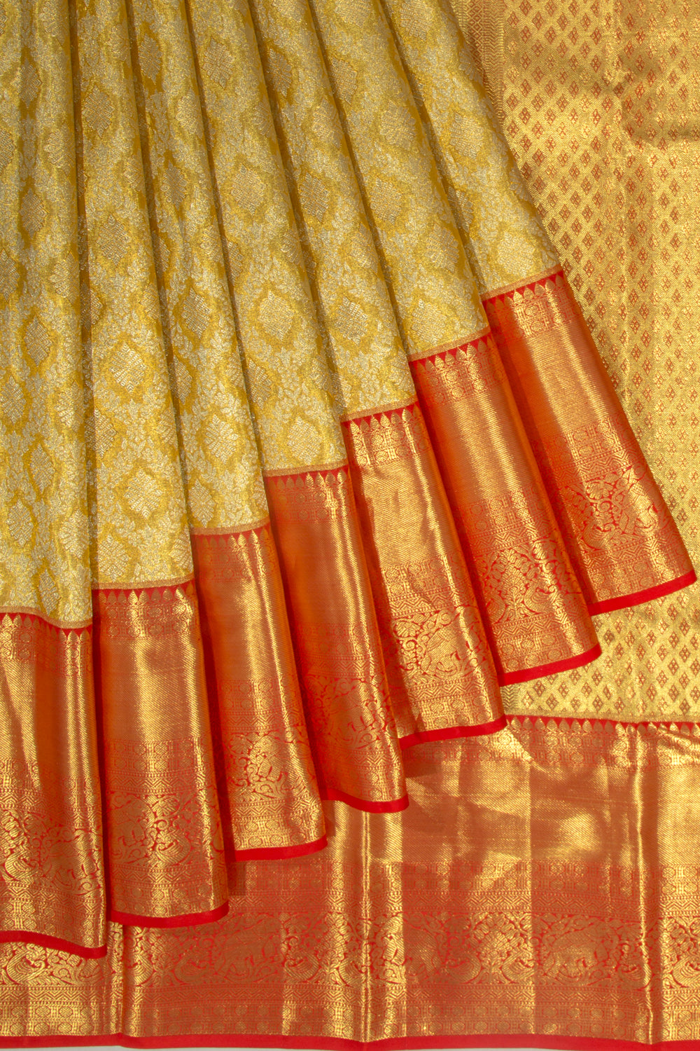 Taranga Kanchi Silk Tissue Brocade Gold Saree